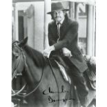Charles Bronson signed 10x8 black and white photo. Charles Bronson (born Charles Dennis Buchinsky;