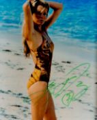 Kim Basinger signed 10x8 colour photo in swimsuit. American actress, singer, and former fashion