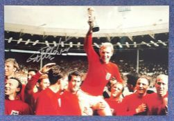 Football Geoff Hurst signed 18x12 colour photo pictured celebrating with his England team mates