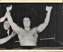 Boxer Roy Shaw Signed on a black and white photo Showing Shaw After a Boxing Fight. Signed in