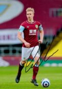 Ben Mee Signed Burnley 8x12 Photo. Good condition. All autographs come with a Certificate of