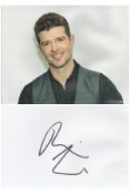 Singer, Robin Thicke signature piece featuring a 10x8 colour photograph and a signed white card. The