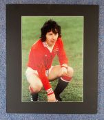 Mickey Thomas Signed Manchester United 12x14 Mounted Photo. Good condition. All autographs come with