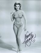 Nancy Kovack signed 10x8 black and white photo. Good condition. All autographs come with a