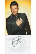 Singer, Peter Andre signature piece featuring a approx10x8 colour photograph and a signed white