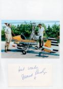 James Bond Desmond Llewelyn signature piece below colour photo. Good condition. All autographs