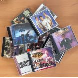 Music collection of signed CD sleeves complete with discs, 12 in total. Titles include Andrew