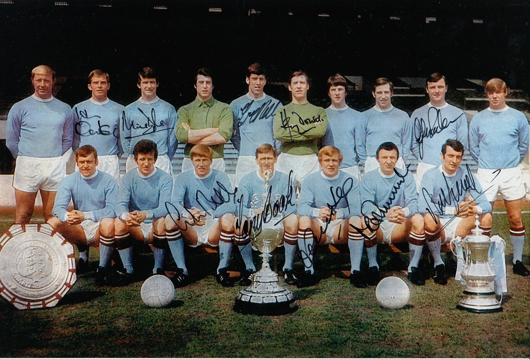 Autographed MANCHESTER CITY 12 x 8 photo - Col, depicting City players posing with the Charity