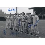 Autographed LEICESTER CITY 12 x 8 photo - B/W, depicting Leicester players standing shoulder to