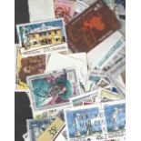 Assorted stamp collection in bags. Assorted world stamps, GB and BCW. Assorted on and off backing