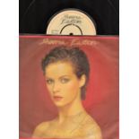 Singer, Sheena Easton signed 45 RPM sleeve complete with disc. Featured on the disc is her song Take