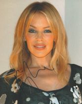 Kylie Minogue signed 10x8 colour photo. Kylie Ann Minogue AO OBE ( born 28 May 1968), sometimes