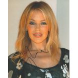 Kylie Minogue signed 10x8 colour photo. Kylie Ann Minogue AO OBE ( born 28 May 1968), sometimes