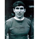 Tony Dunne Signed 16 x 12 Black and White Photo. Good condition. All autographs come with a