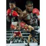 Frank Bruno Signed 16 x 12 Colourised Montaged Photo. Good condition. All autographs come with a