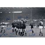 Football Autograph MANCHESTER CITY 12 x 8 photo B W, depicting players congratulating MIKE SUMMERBEE