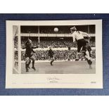 Martin Chivers signed 16 x 23 Artist Proof black and white photo. Photo shows Chivers leaping to