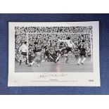 Jimmy Greaves signed 16 x 23 black and white limited edition photo. Photo shows Greaves spreadeagles