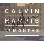 Singer, Calvin Harris signed CD sleeve complete with disc for his album 18 months. With a clear