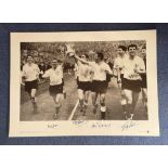 Cliff Jones, Dave Mackay, Jimmy Greaves and Bobby Smith signed Tottenham 16 x 23 black and white