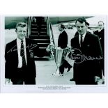 Terry Dyson and Jimmy Greaves signed 16 x 12 black and white print. Print shows the pair bringing