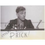Rik Mayall (1958-2014), actor, comedian and writer. A signed approx. 5x4 photo showing a scene