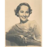 Merle Oberon signed 10x8 vintage sepia photo. British actress. Good condition. All autographs come