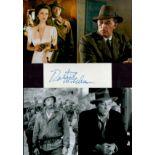 Robert Mitchum 12x8 mounted signature piece includes signed white card and four superb photos