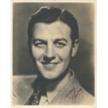 John King signed 10x8 vintage sepia photo with original mailing envelope dated 27 April 1938.