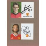 Daley Blind and Adrian Januza signed Man Utd club cards. Fixed to page with corner tabs. Good