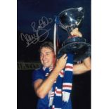 Autographed TERRY BUTCHER 12 x 8 photo - Col, depicting the Rangers captain holding aloft the League