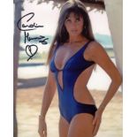 007 Bond actress Caroline Munro signed sexy blue swimsuit pose 8x10 photo. Good condition. All