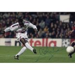 Autographed ANDY COLE 12 x 8 photo - Col, depicting the Man United striker giving his side a 2-1