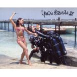 007 James Bond movie Thunderball 8x10 photo signed by actress Martine Beswick. Good condition. All