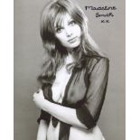 007 Bond girl Madeline Smith signed 8x10 photo pictured in sexy and VERY revealing top. Good