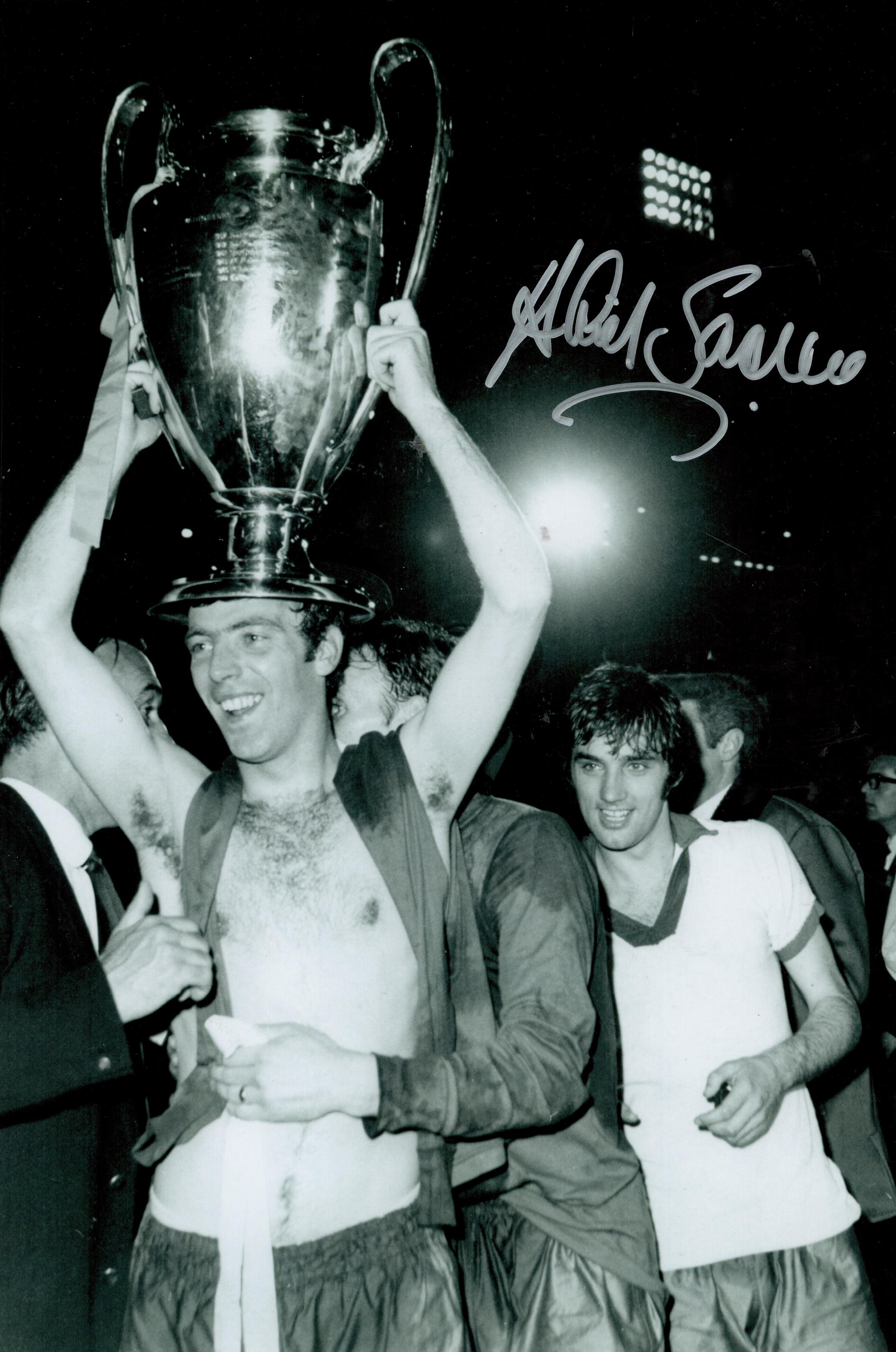 Football Alex Stepney signed 12 x 8 inch b/w photo alongside George Best holding European Cup.
