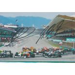 Michael Schumacher And Adrian Sutil Signed 2010 Formula One 5x7 Photo. Good condition. All