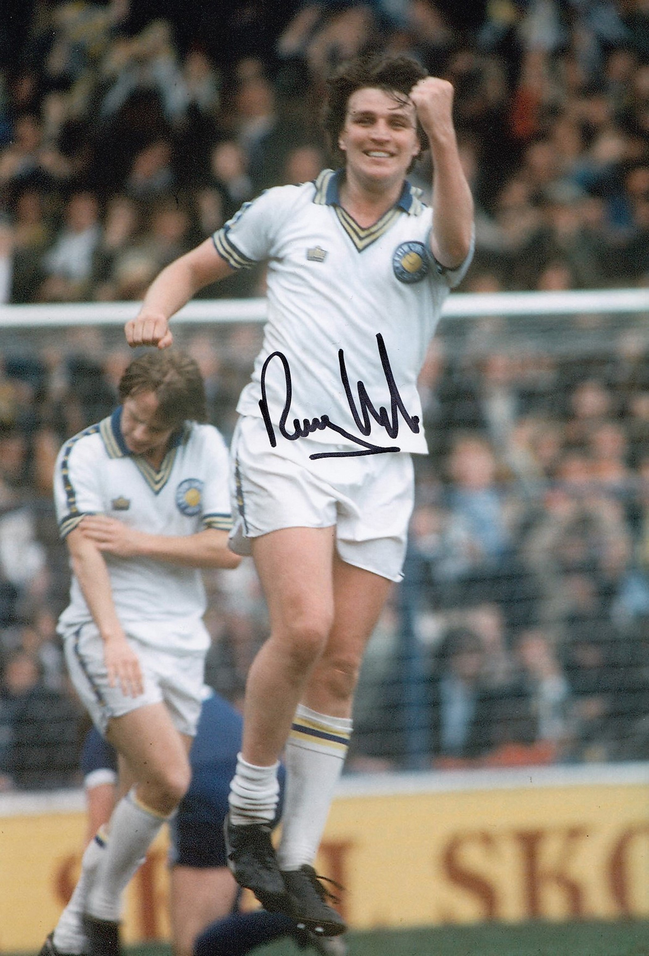 Autographed RAY HANKIN 12 x 8 photo - Col, depicting the Leeds United striker jumping with joy as he