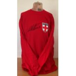 Sir Geoff Hurst Hand signed 1966 Retro Red England World Cup Winners Shirt. Signed in black ink.