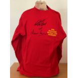 Geoff Hurst and Martin Peters Signed 1966 England Red Retro World Cup Winners Shirt. Size Large.