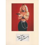 Actor, Sybil Danning mounted signature piece. This beautiful item features a colour photo and a