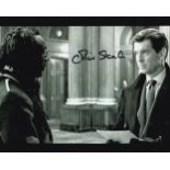 Oliver Skeet, Bond Film Actor, 10x8 inch Signed Photo. Good condition. All autographs come with a
