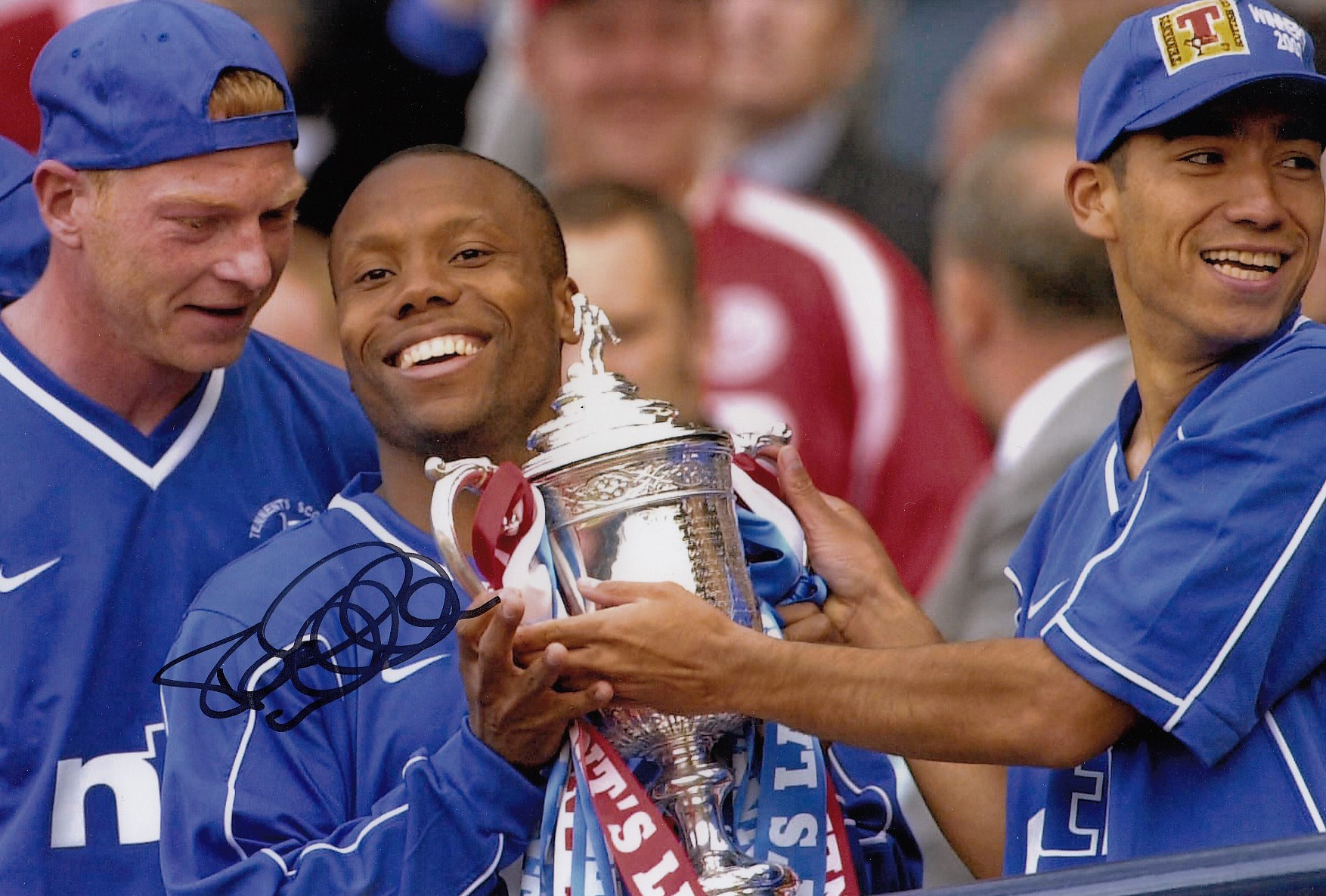 Autographed Rod Wallace 12 X 8 Photo colour, Depicting The Rangers Striker With Team Mates Albertz