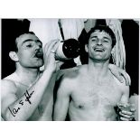 Ian St John Signed 16 x 12 inch Black and White Glossy Photo Pictured Drinking Champagne. Signed