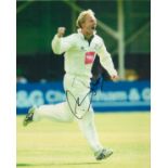 Former England Cricketer Gareth Batty Signed 10x8 inch Colour Photo. Signed in black ink. Good