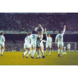 Autographed Peter Lorimer 12 X 8 Photo colour, Depicting Leeds United Players Congratulating Lorimer