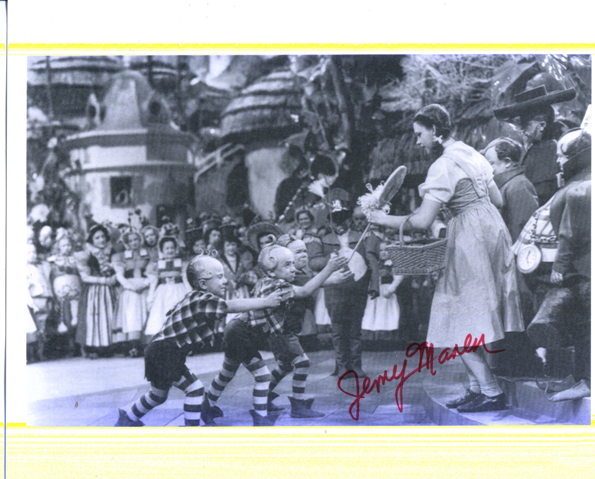 The Wizard of Oz 8x10 movie scene photo signed by Munchkin actor Jerry Maren (The Lollipop kid).