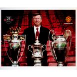 Football Alex Ferguson signed 10 x 8 inch colour photo standing with three trophies, to Brian.