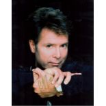 Cliff Richard signed 10x8 colour photo. Good condition. All autographs come with a Certificate of