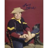 Larry Storch signed 8x10 photo from the comedy series F-Troop. Good condition. All autographs come